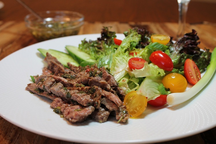 Thai beef salad with grilled sirloin tips, cucumber, mint and roasted peanuts.