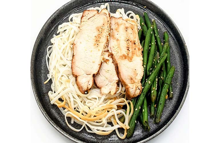 Grilled teriyaki pork with rice noodles and sesame green beans.