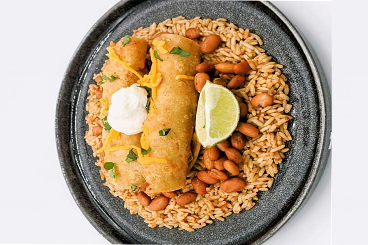 Low sodium chicken enchilada served with pinto beans and Spanish rice.